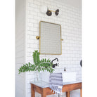 Theo shown in Matte Black and Brass with Opal 6" globes. Interior design and photo by Brittany Boothby