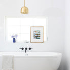 Amélie Cord 8" shown in Brass with Brass Rod Detail. Interior design by Jenny Komenda of Juniper Studio.