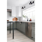 Isle Sconces shown in Matte Black with Brass. Interior Design by The Habitat Collective. Photo by Christine Michelle Photography