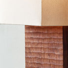 Ode Sconce shown in Walnut